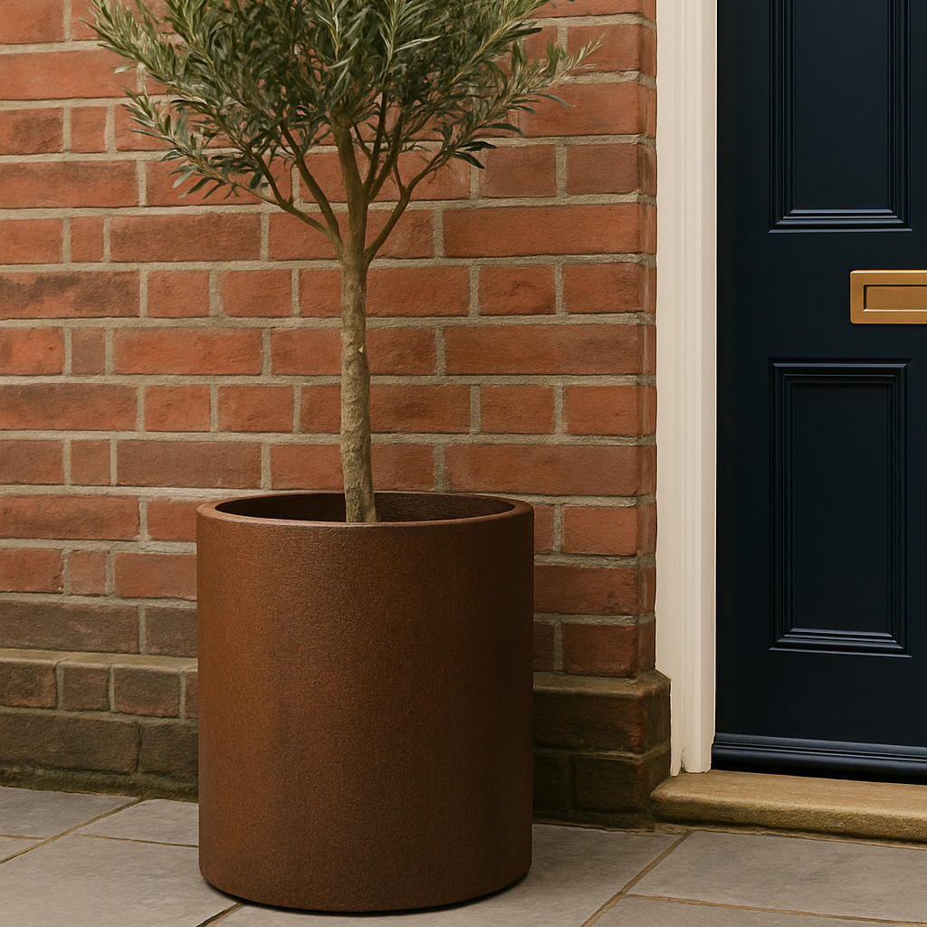 Potted plant in front of a brick wall and dark door