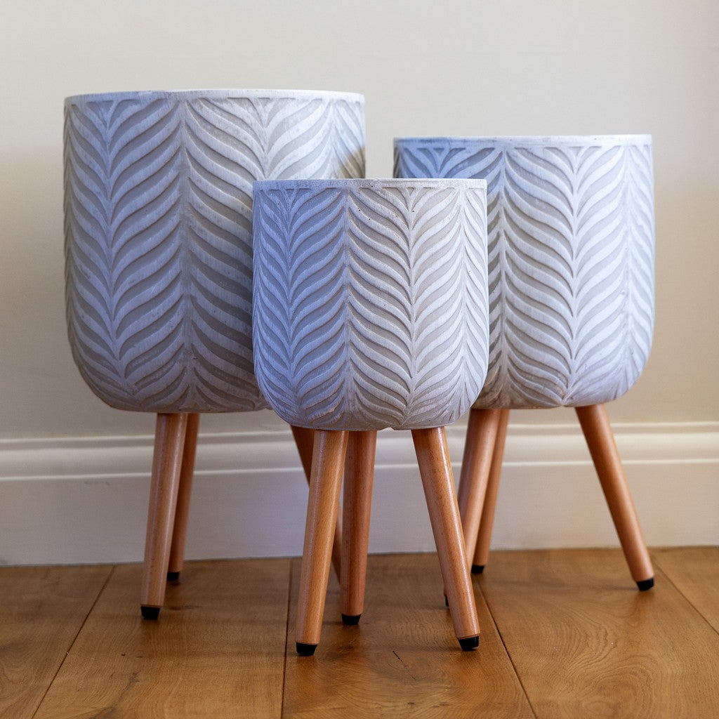 white plant pot with wooden legs Patterned Fern Indoor Planter on Legs