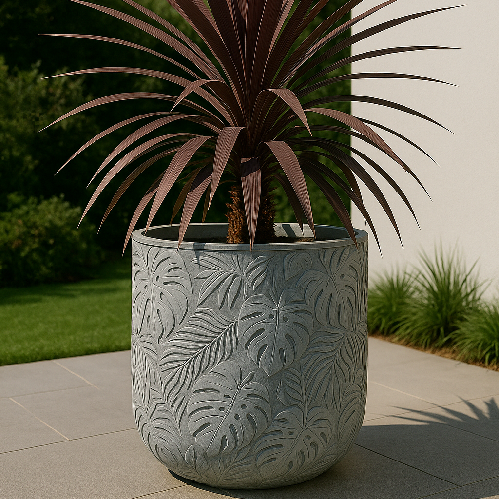Potted plant with purple leaves in a decorative pot on a patio